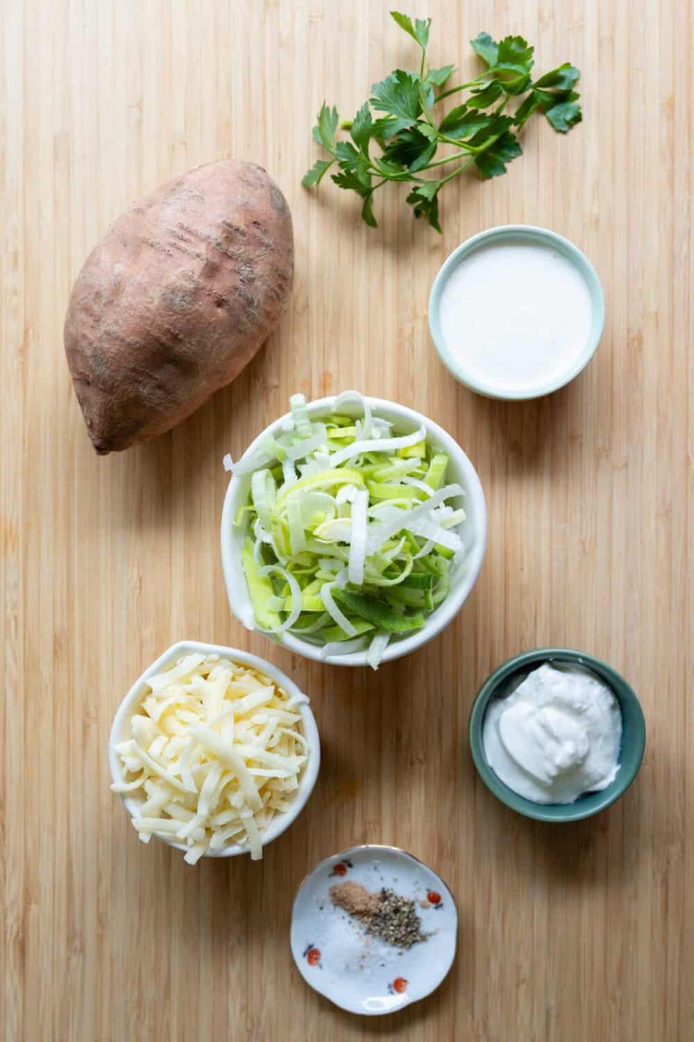 Ingredients for Sweet Potato Gratin laid out on a kitchen counter.