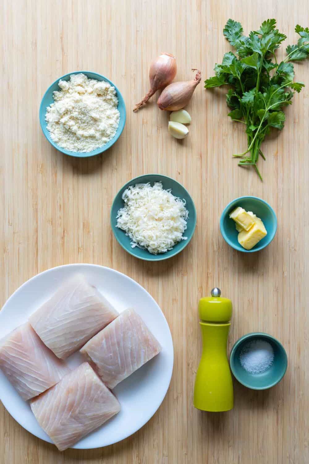 Ingredients for Mahi Mahi with Almond Parmesan Crumble laid out on a kitchen counter.