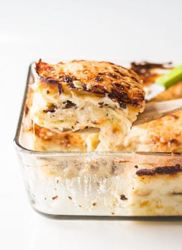 Close up of a piece of finished Artichoke Mushroom Lasagna with Bechamel Sauce.