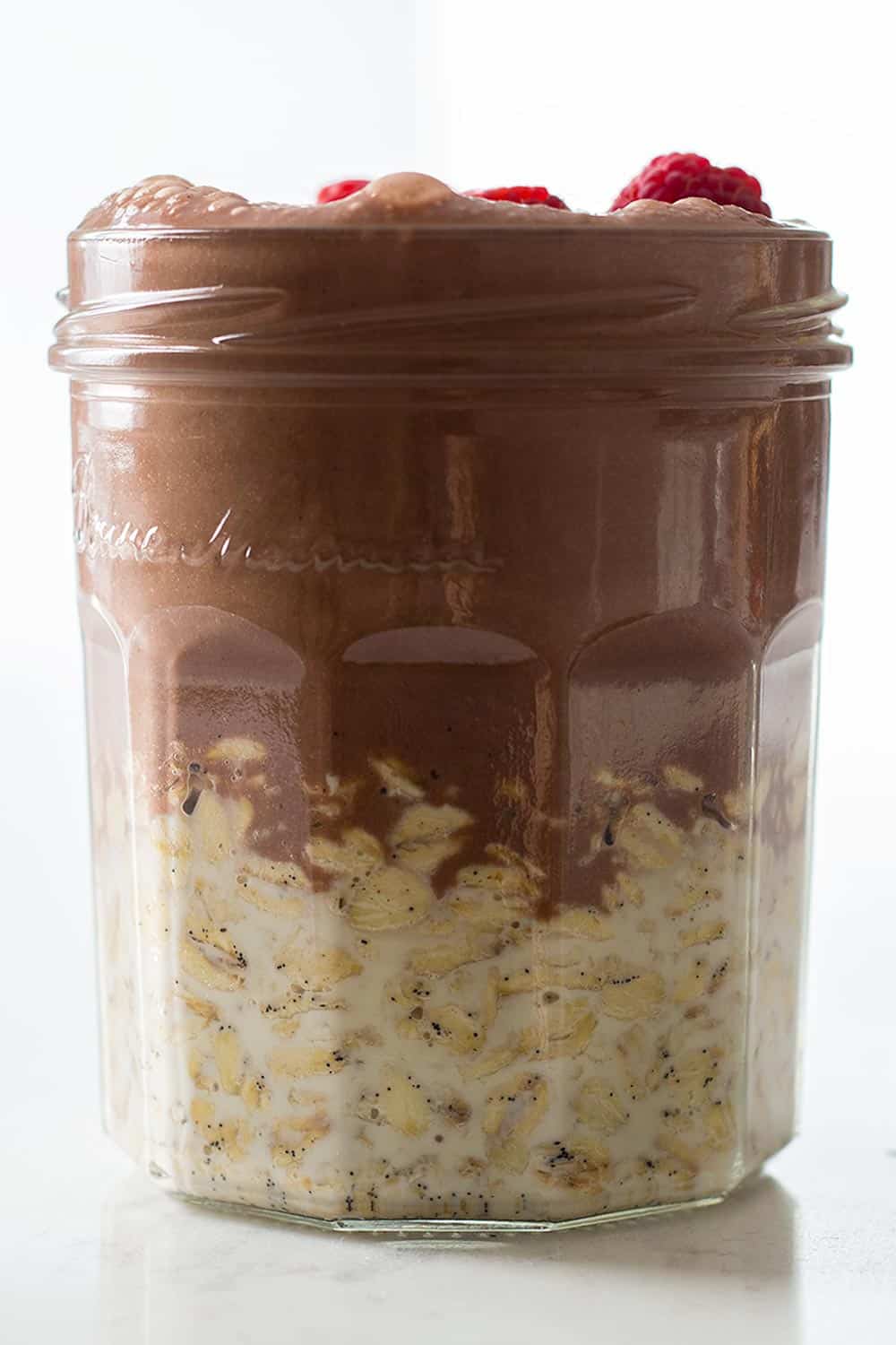 Vanilla Overnight Oats topped with Chocolate Peanut Butter Banana Smoothie