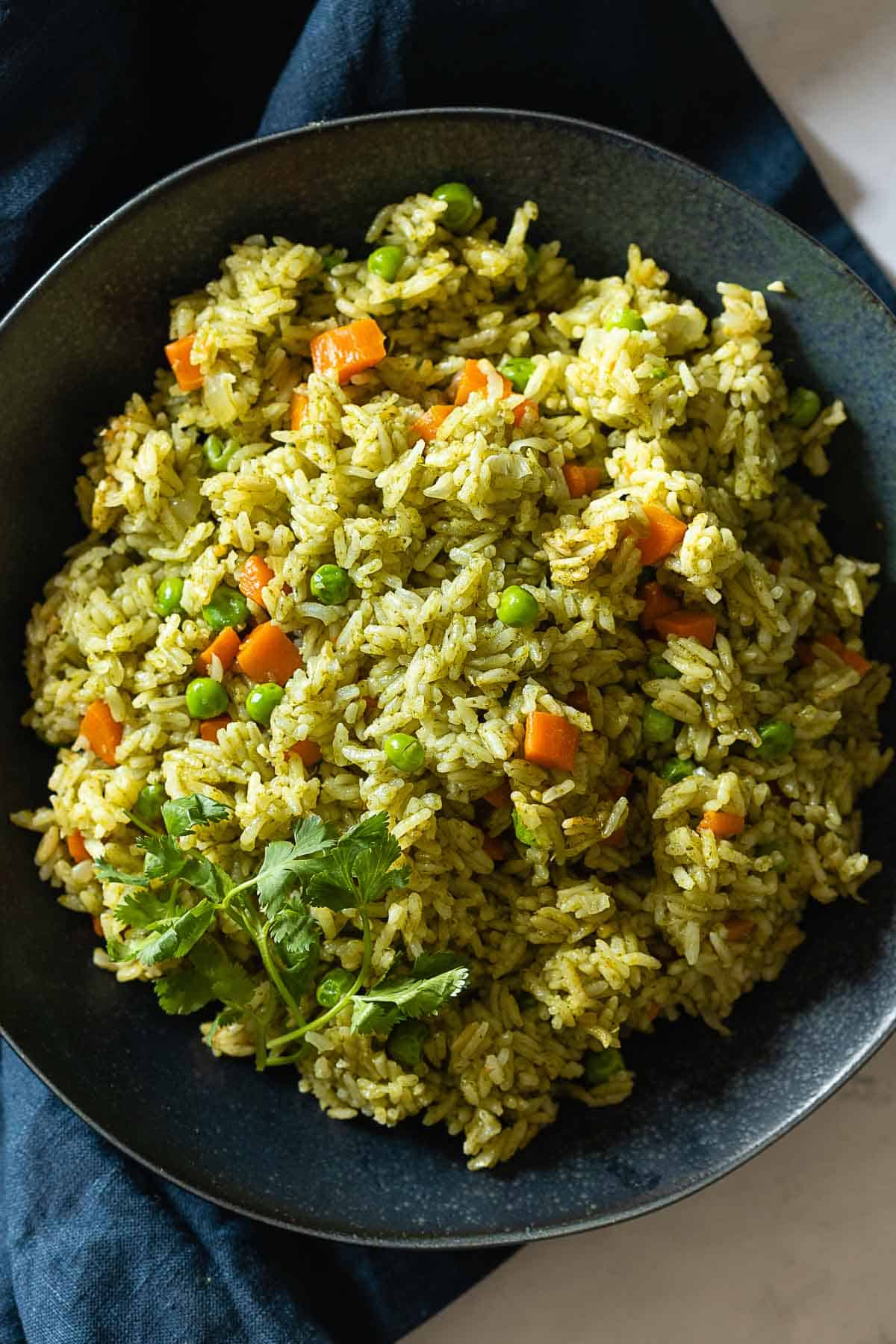 Green rice in a bowl.