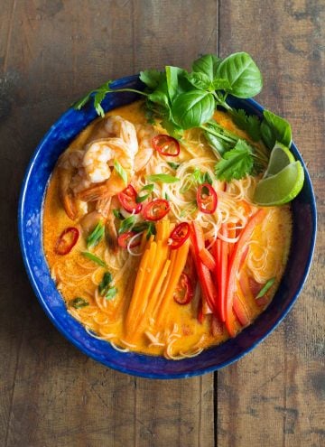 Coconut curry soup in a blue bowl