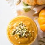 top down view of pumpkin smoothie topped with seeds