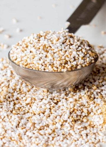 Popped amaranth in a measuring spoon
