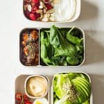 A healthy keto dinner for a complete keto diet plan- butter lettuce, avocado, hemp seed salad with mayonnaise, a soft boiled egg and cherry tomatoes.