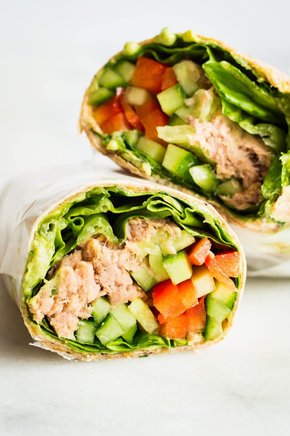 Healthy Tuna Wrap cut in two halves.