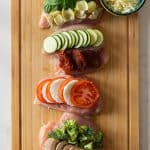 Raw Stuffed Chicken Breast on a cutting board