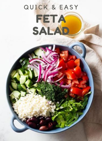 Feta Salad in a blue bowl with text overlay for Pinterest