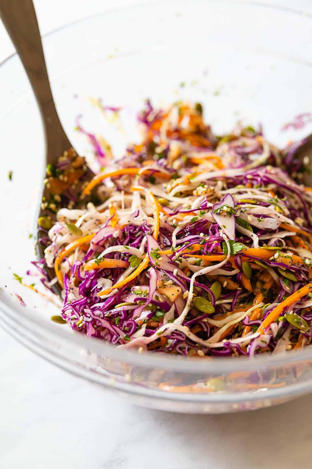 Healthy Coleslaw in a large glass salad bowl.
