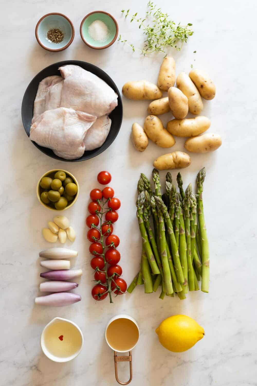 Ingredients for Mediterranean Chicken Dinner all laid out on a kitchen counter.