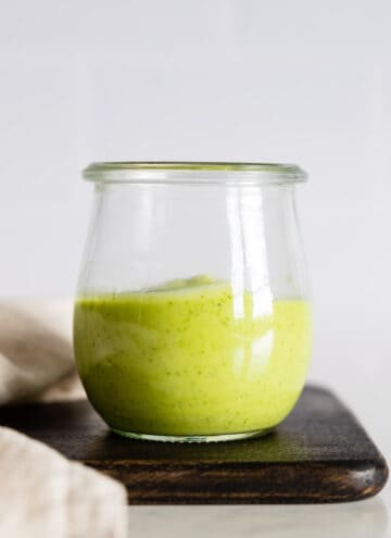 Cilantro Lime Avocado Dressing in a glass jar.