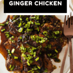 Lemongrass ginger chicken thighs on a white plate with text overlay for Pinterest.