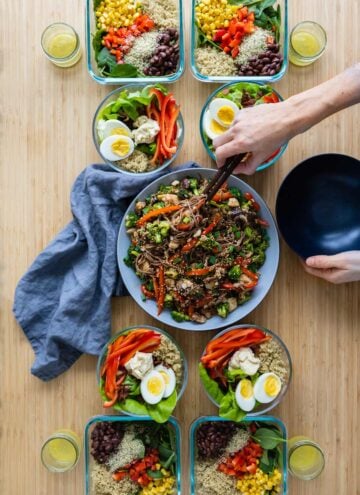 3 different Meal Prep Recipes lined up on a kitchen table.