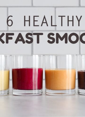 6 breakfast smoothies of different colors lined up next to each other.