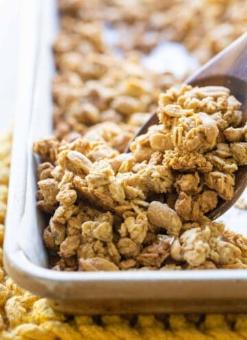 Close-up of baked peanut butter granola on a baking sheet.