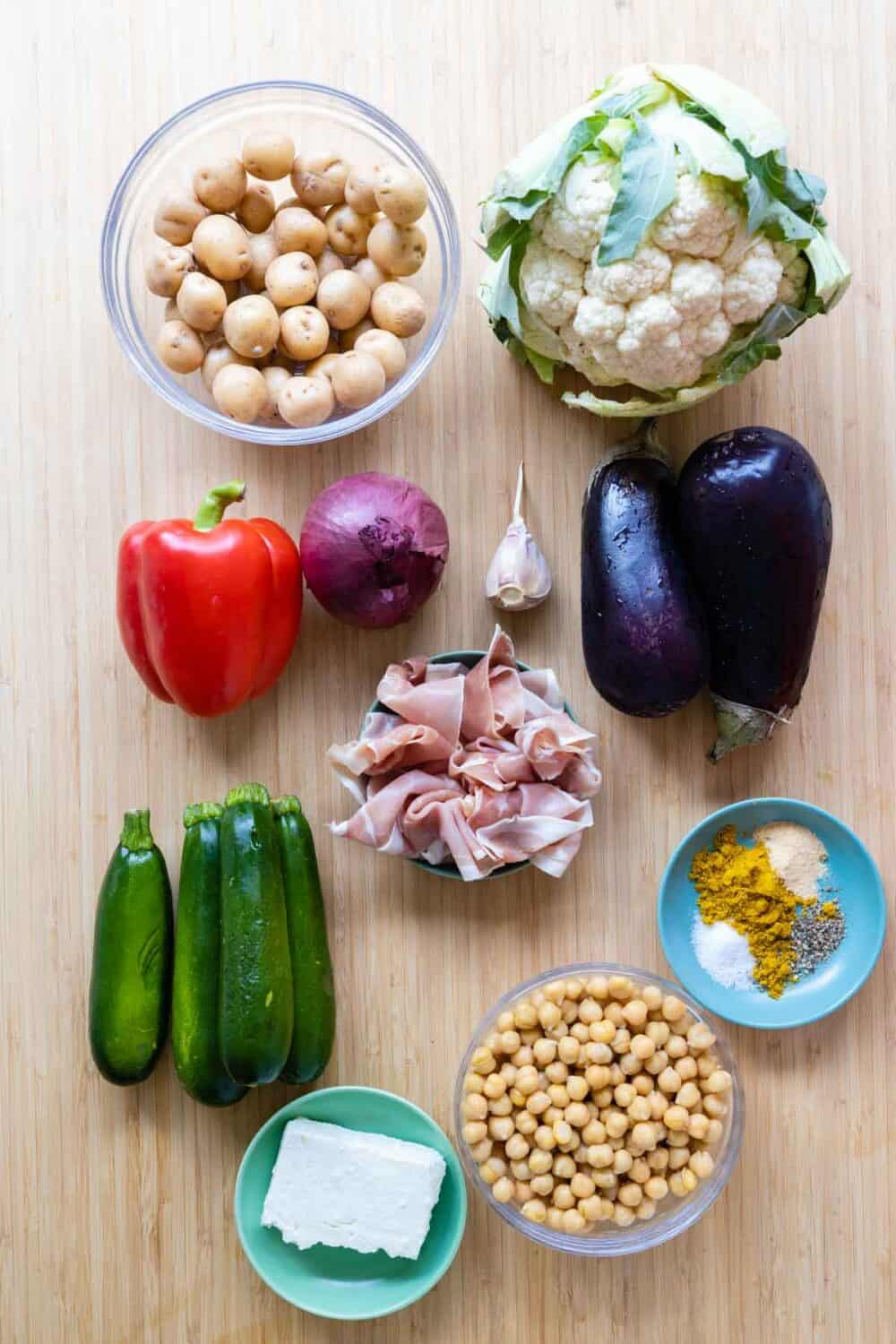 Ingredients for chickpea meal prep bowls laid out on a kitchen counter.