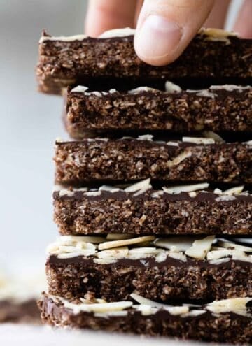6 Almond Granola Bars stacked one on top of the other.