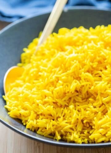 Yellow Rice in a blue bowl.