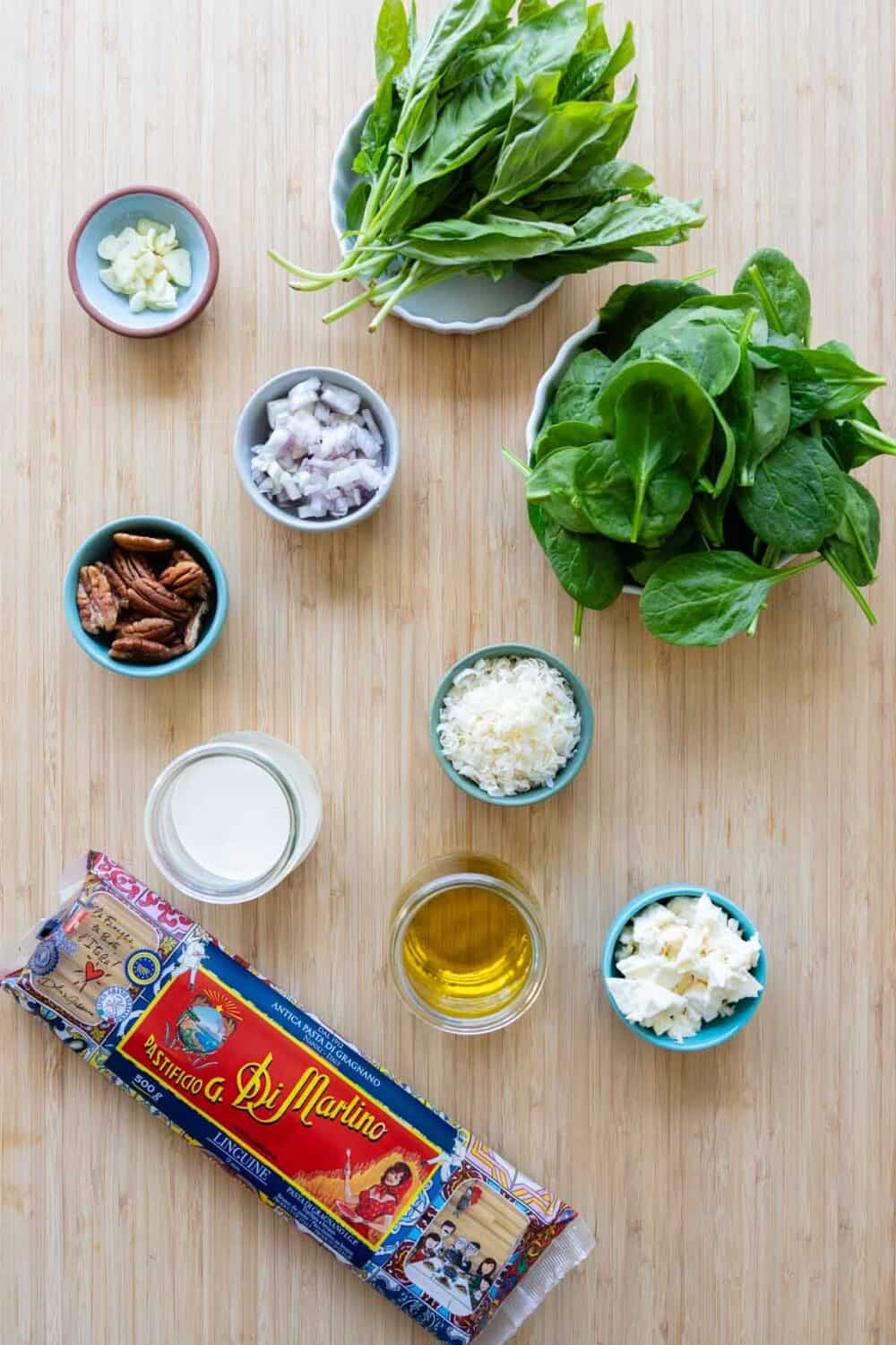 Ingredients to make tallarín verde laid out on a kitchen counter.